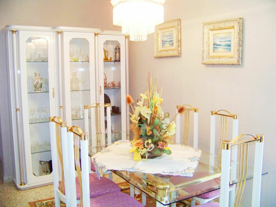 Table, Furniture, Flower, Picture Frame, Decoration, Chair, Textile, Orange, Interior Design, Building
