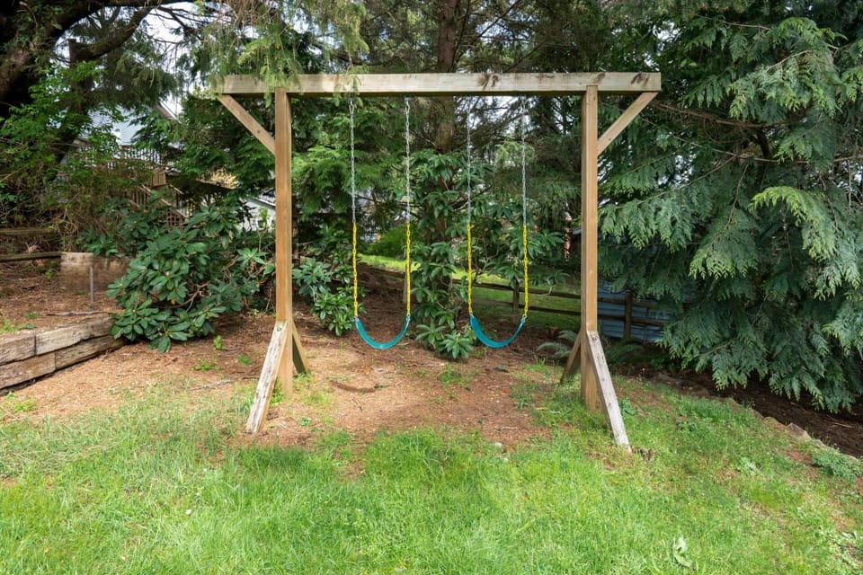 A swing set for guest enjoyment.