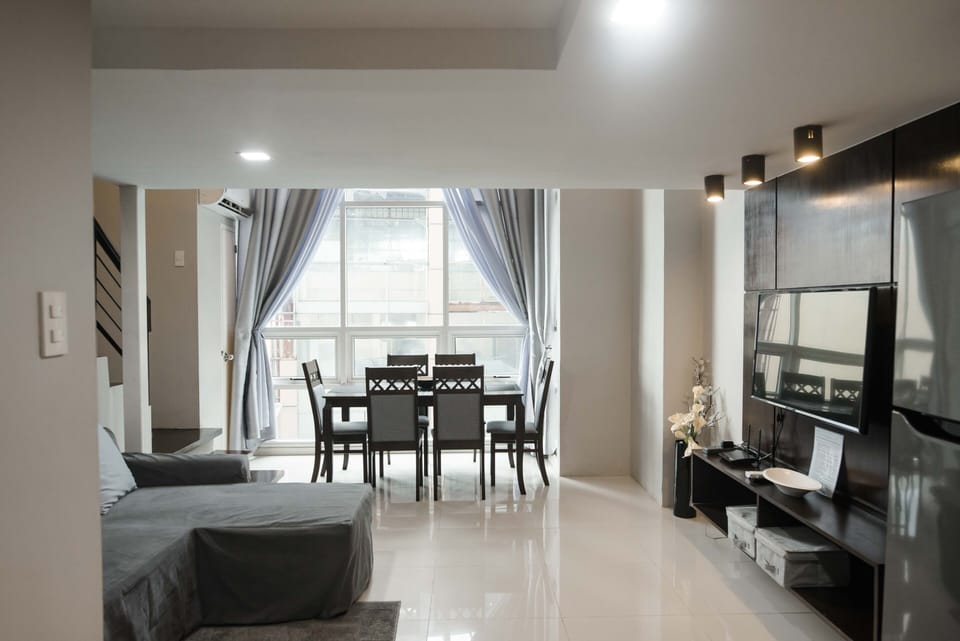 Bask in an abundance of natural light that floods the area through large windows