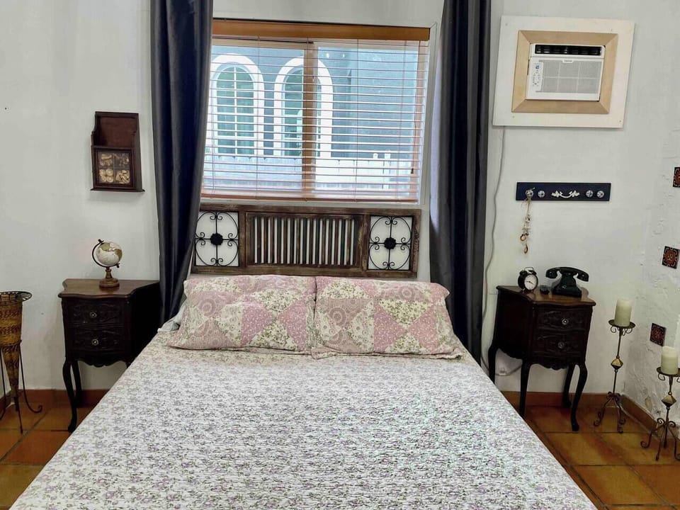 Comfortable queen sized bed with memory foam mattress.