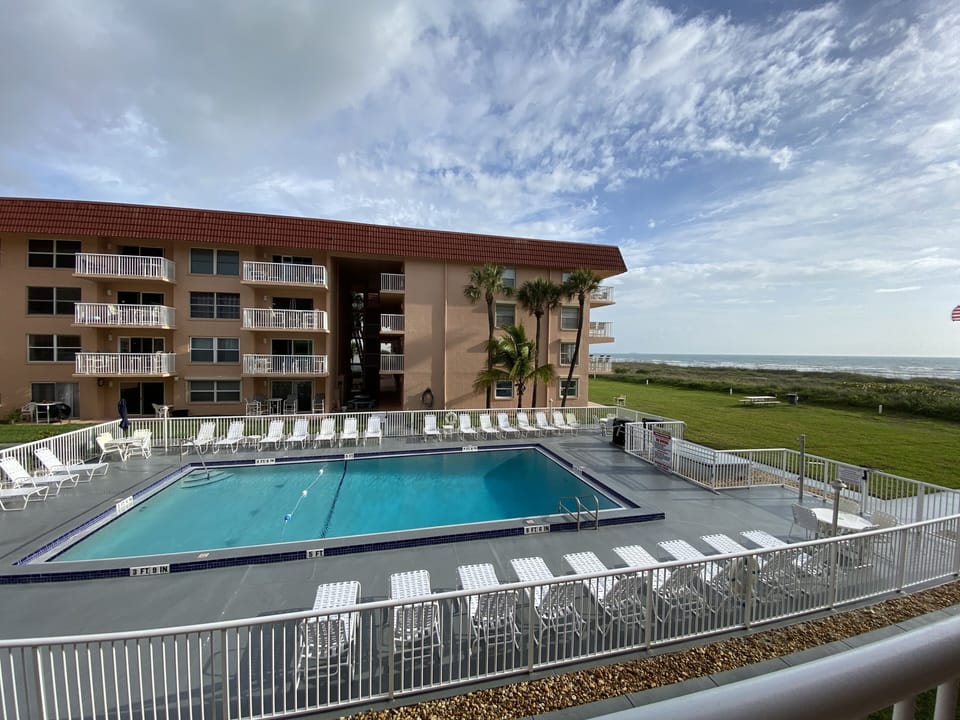Heated community pool with plenty of seating for fun in the sun. 