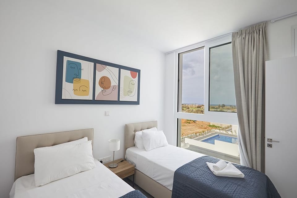 Bedroom 3 with two single beds