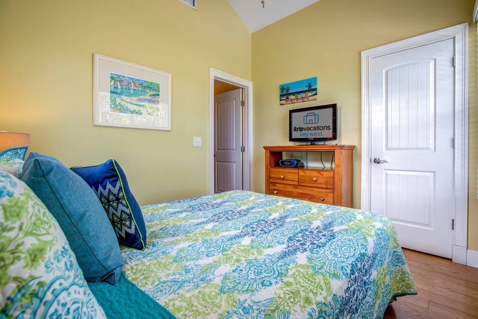 Enjoy watching TV in the comfort of your cozy queen-size bed before drifting off to a peaceful night's sleep.