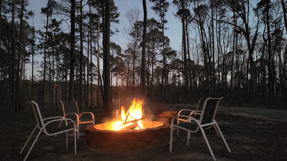 Main firepit at dusk, bring your marshmallows and hot dogs!