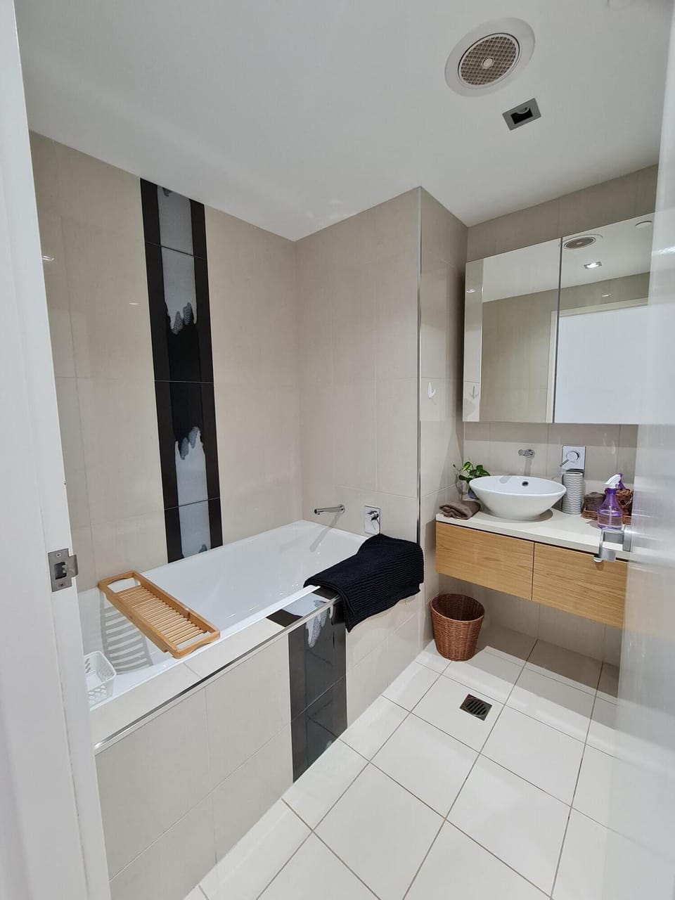 2nd bathroom with bath, shower and toilet.