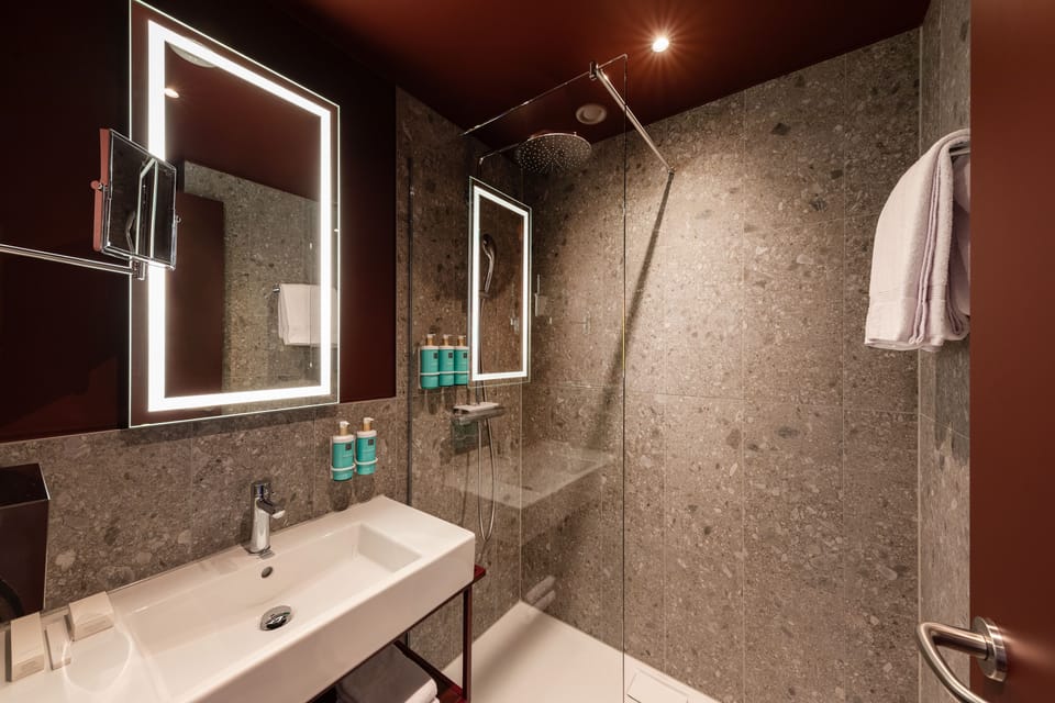 Shower, rainfall showerhead, eco-friendly toiletries, hair dryer