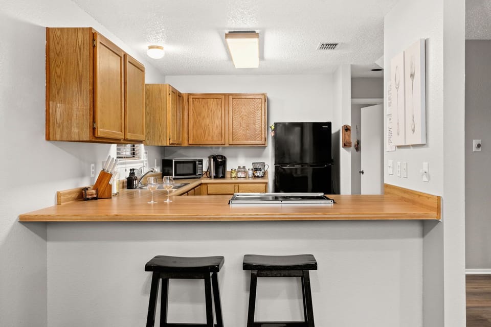 Grab a seat, and enjoy a glass of wine while someone cooks dinner!