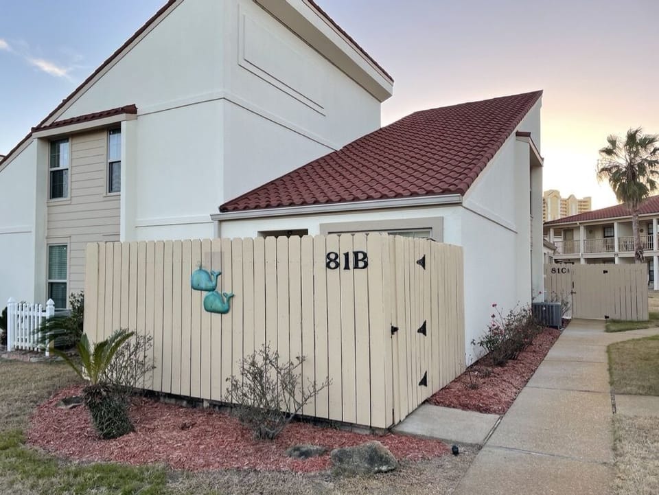 Private patio and entrance to the property front door