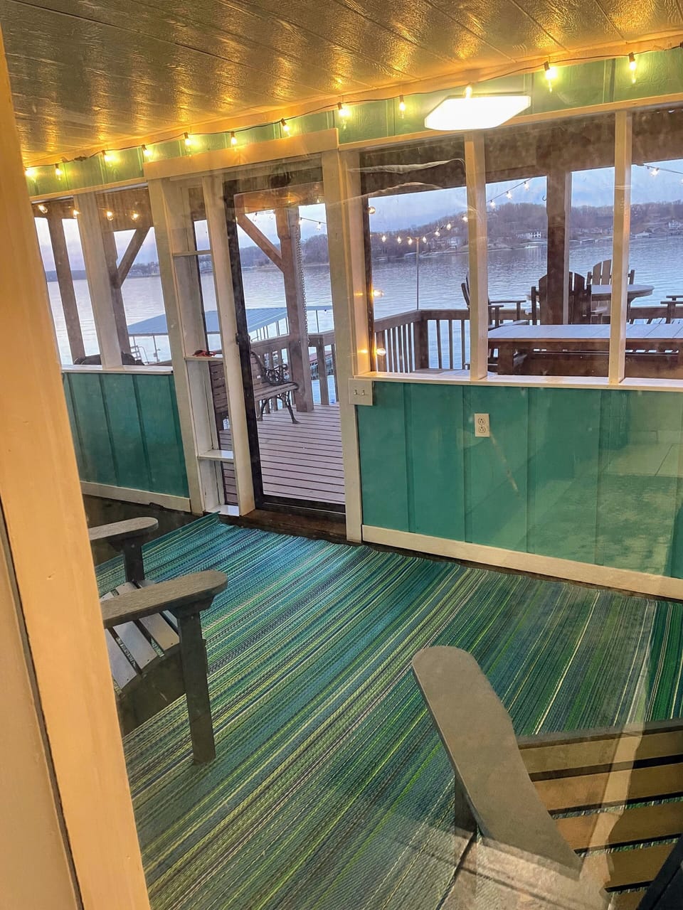 2nd bedroom view of screened in  porch and martini deck