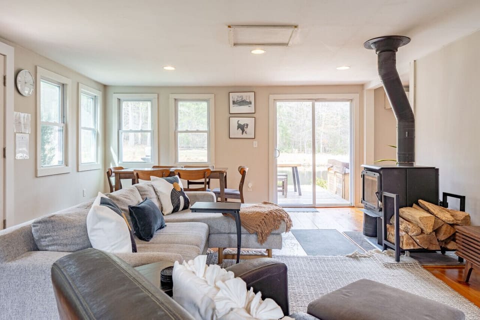 Open floor plan with living/dining room and access to back deck