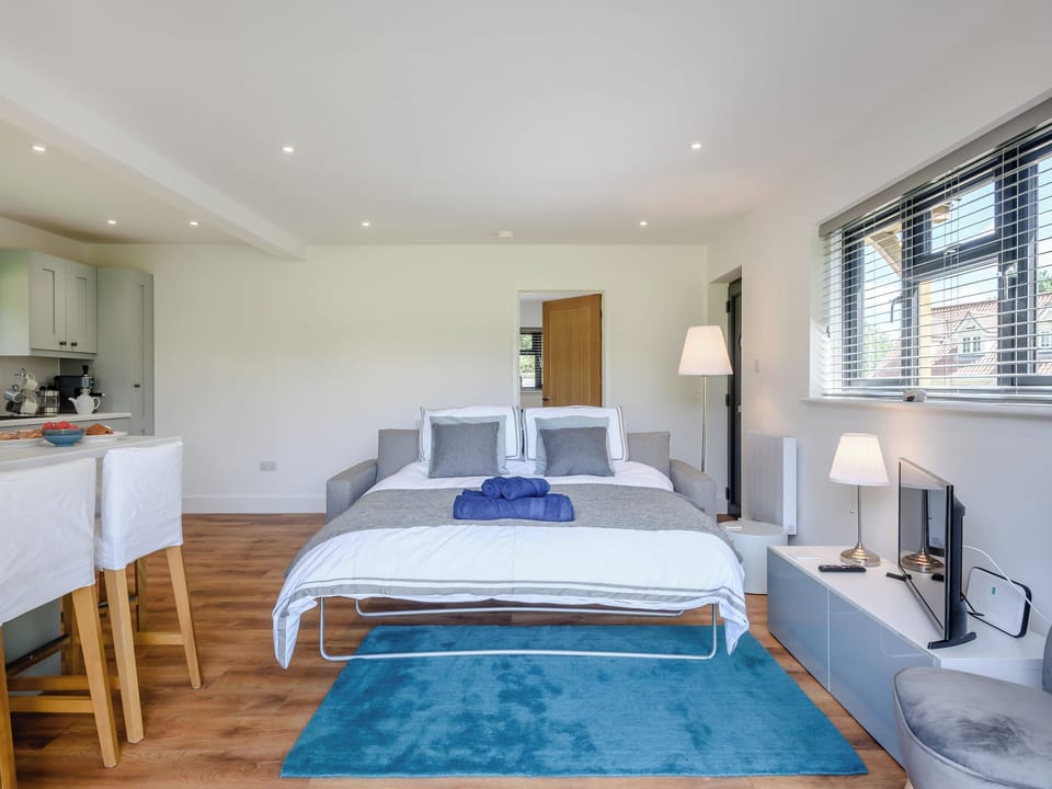 Living area with sofa bed | Willow Cottage, Stonham, near Needham Market