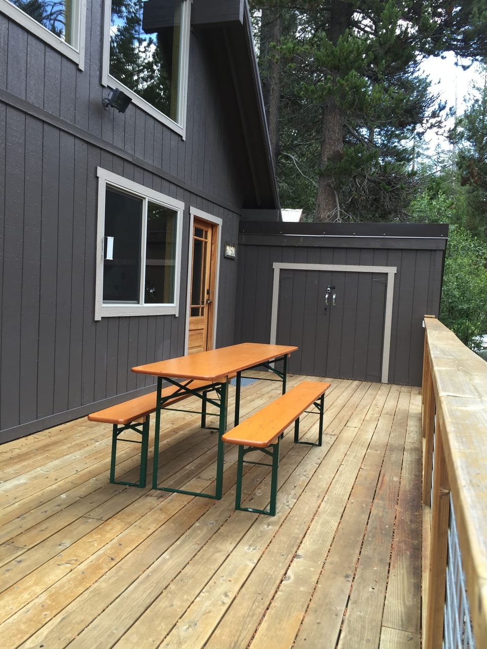 German beer garden table stashes behind couch