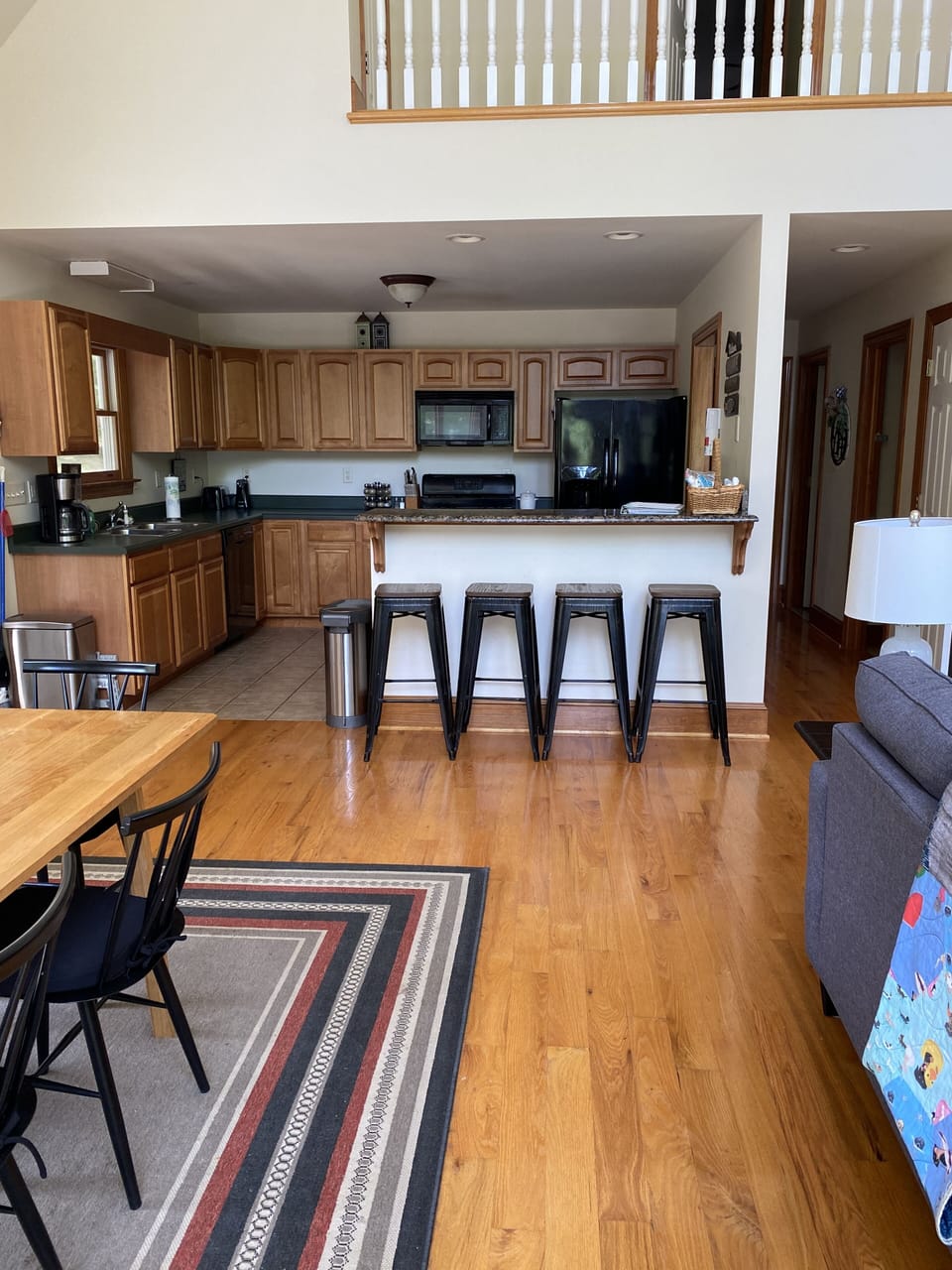 Seating for four at the bar along with table that seats 10-12 , and full kitchen