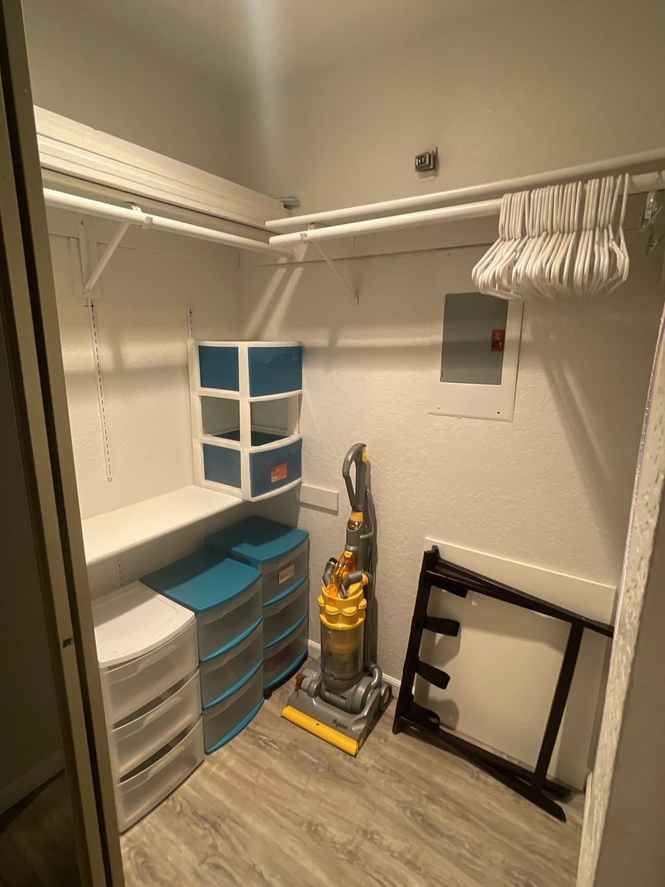Second closet with lots of storage and hangers.