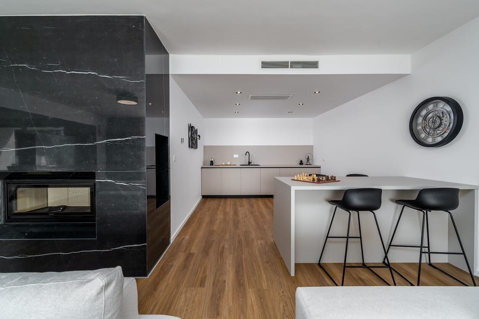 Kitchenette, a fire place for romantic evenings, and a covered Terrace 27sqm with amazing sea and pool views