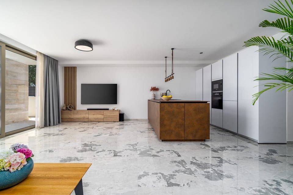 Enjoy the sea views or the calming views on the pool area where you have direct access from the living room