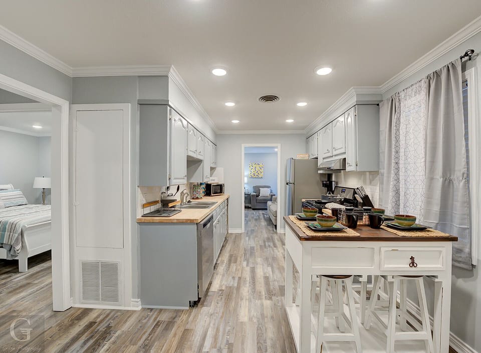 Kitchen is open and inviting with most amenities needed to feel at home.
