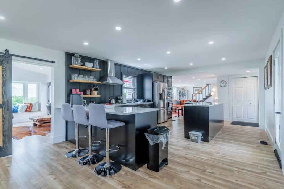Fully equipped & modern kitchen with all new kitchen appliances, & mini bar counter, gives your stay a luxurious touch