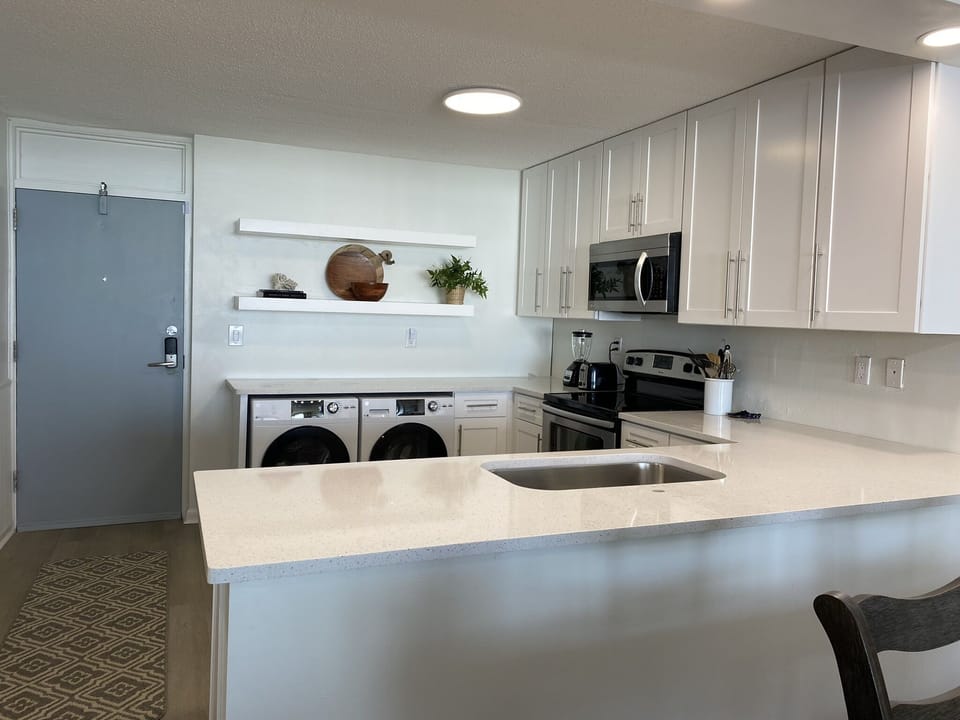 Remodeled: New cabinets, countertops, appliances. Fully stocked kitchen.