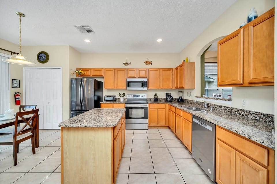 The Full kitchen features granite counter tops and new appliances.