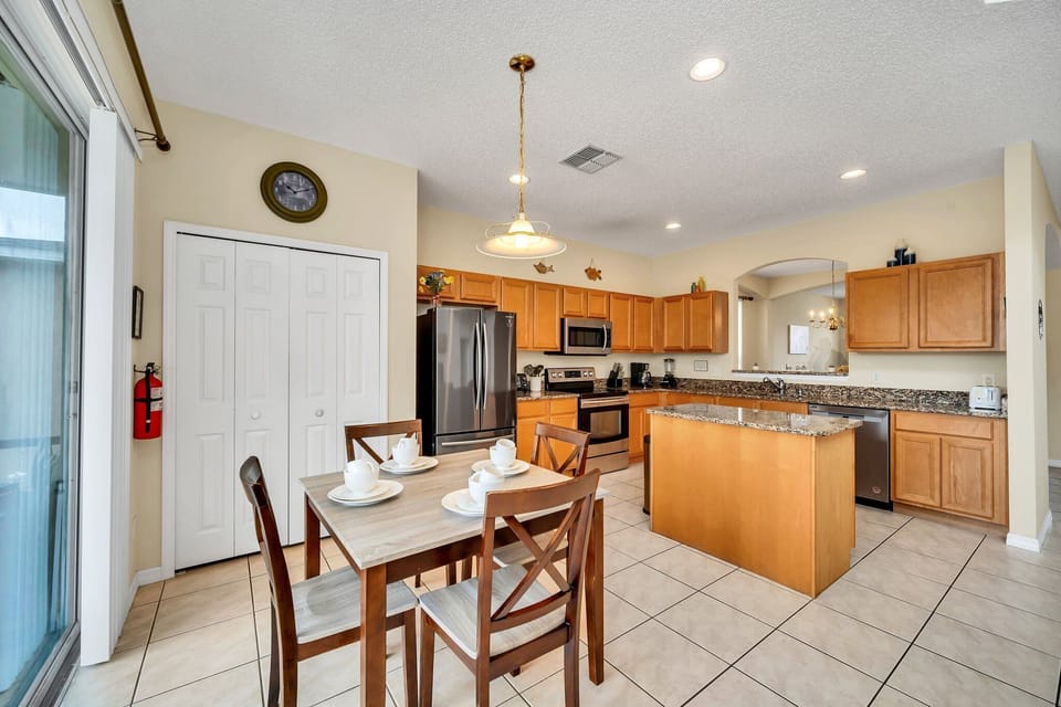 The Full kitchen features granite counter tops and new appliances.