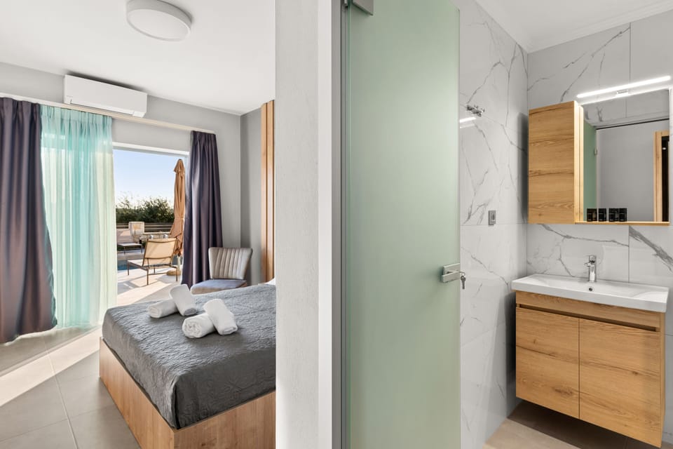 Premium bedding, pillowtop beds, laptop workspace, blackout drapes