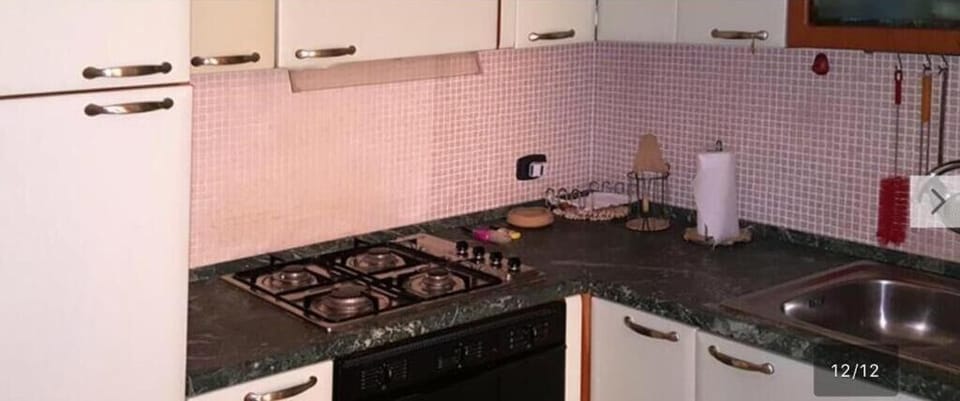 Full-size fridge, oven, stovetop, cookware/dishes/utensils