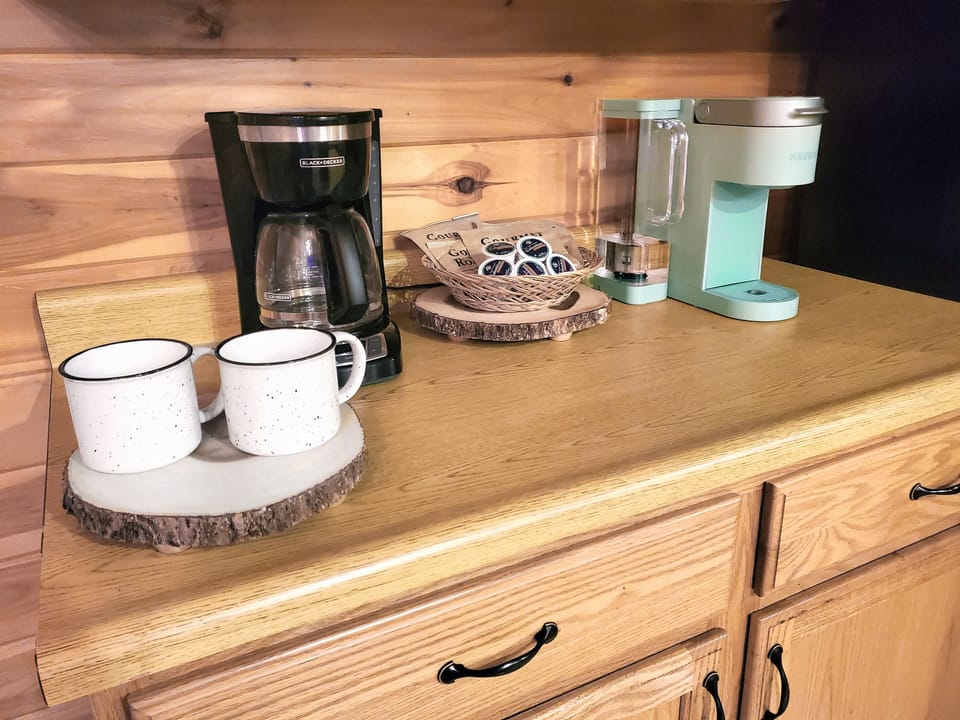 The Coffee Counter is equipped with a drip coffeemaker and Keurig