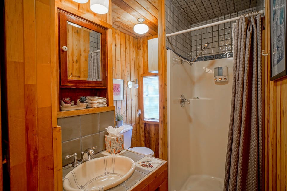 Downstairs full bath with walk-in shower.
