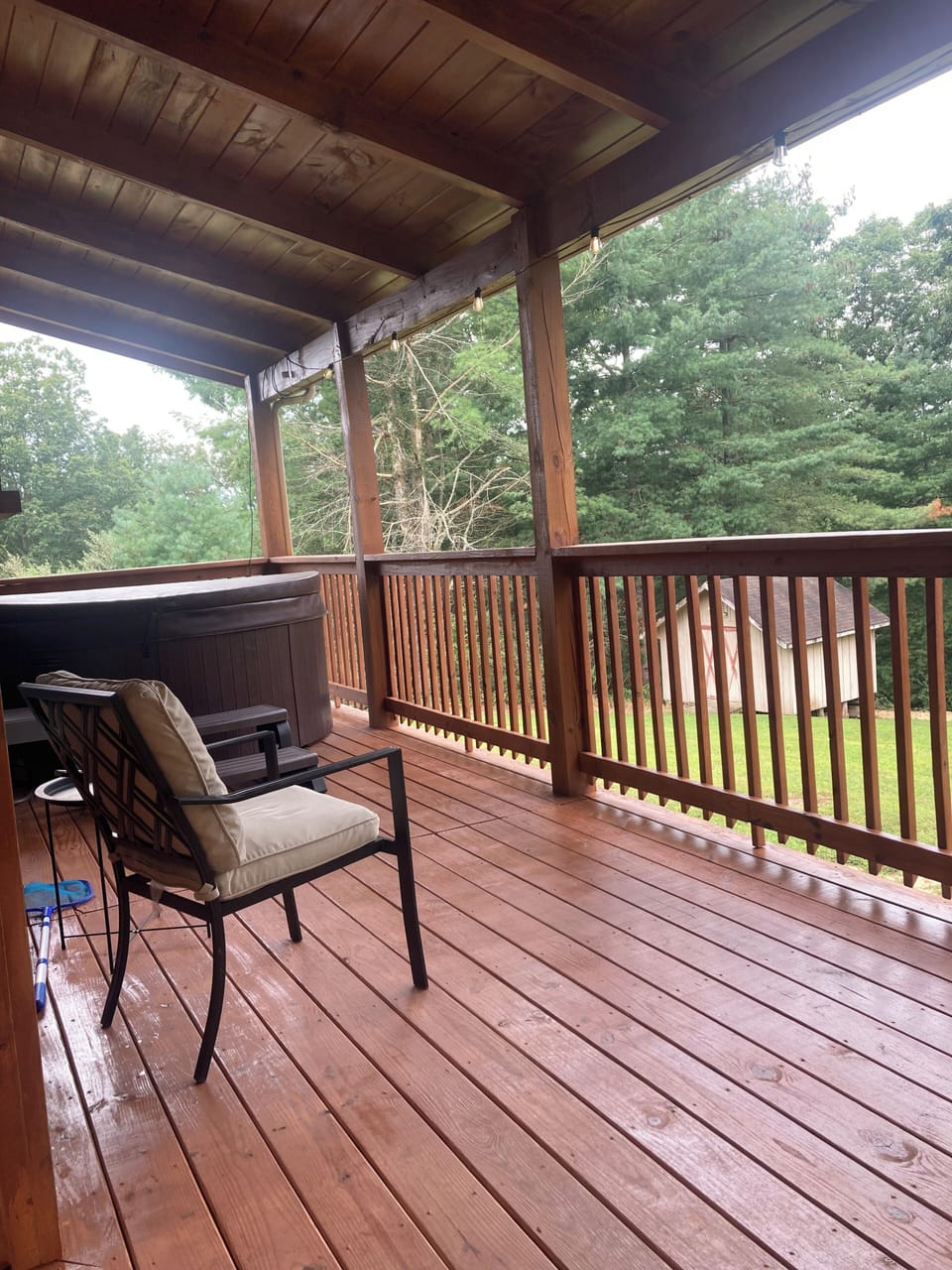 Spacious porch with private hot tub