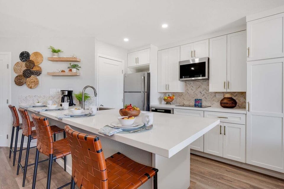 Stylish open design featuring a spacious kitchen and dining area perfect for shared meals and conversation