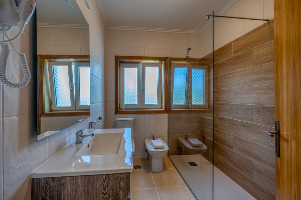 Free toiletries, hair dryer, bidet, towels