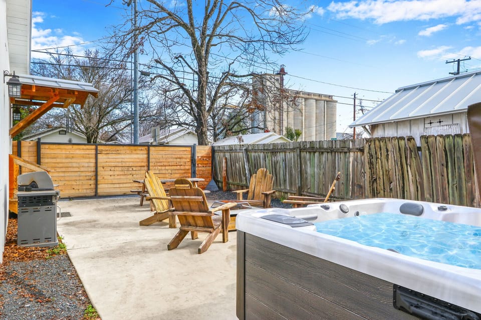 Private hot tub in enclosed back yard.