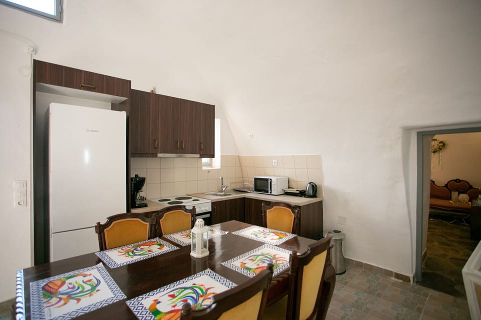Dining area of Stone built villa for 8,Private garden,Near Beach, supermarket,Mani