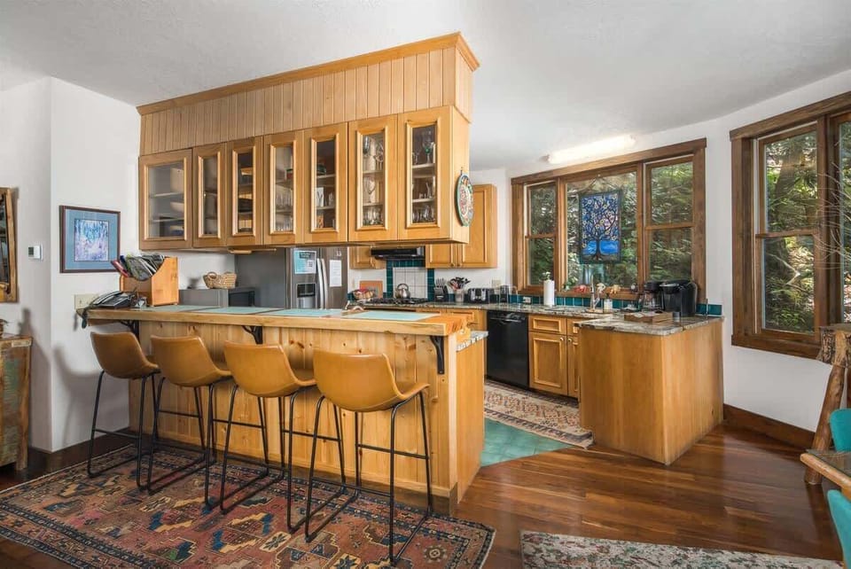 The spacious kitchen with bar seating has everything you need.