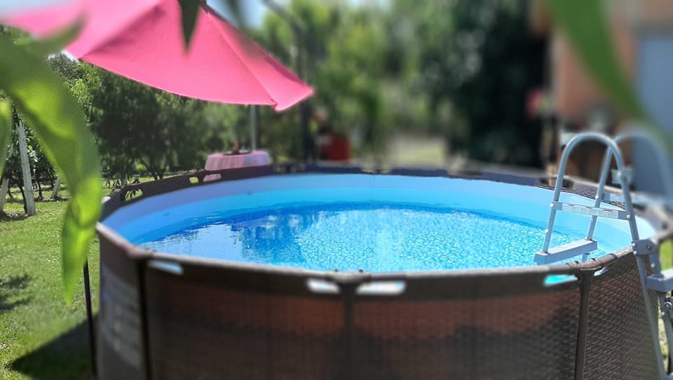 Apartment (Two Bedroom Apartment with Terrace) | Pool | Outdoor pool, pool umbrellas, sun loungers