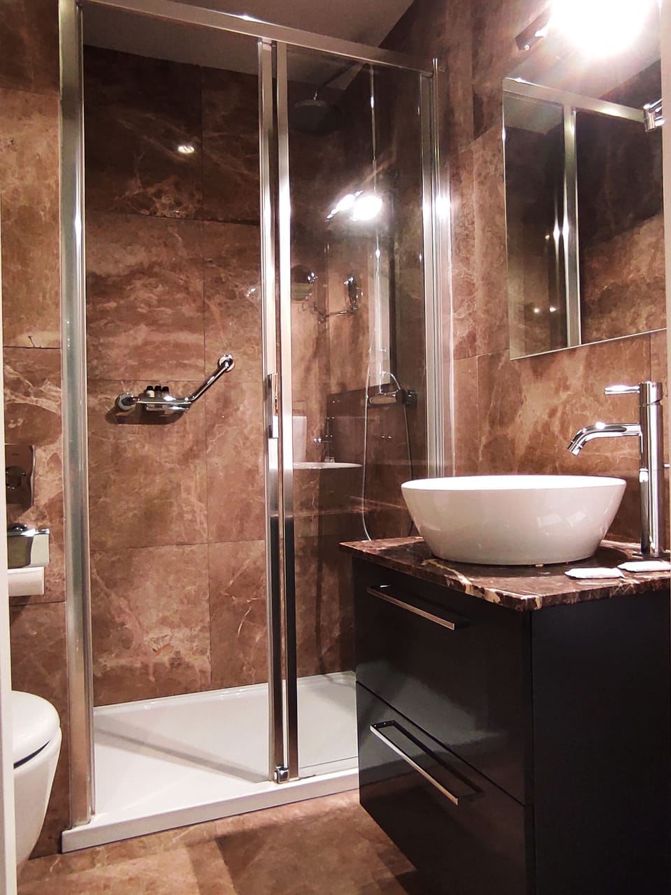 Shower, free toiletries, hair dryer, bathrobes