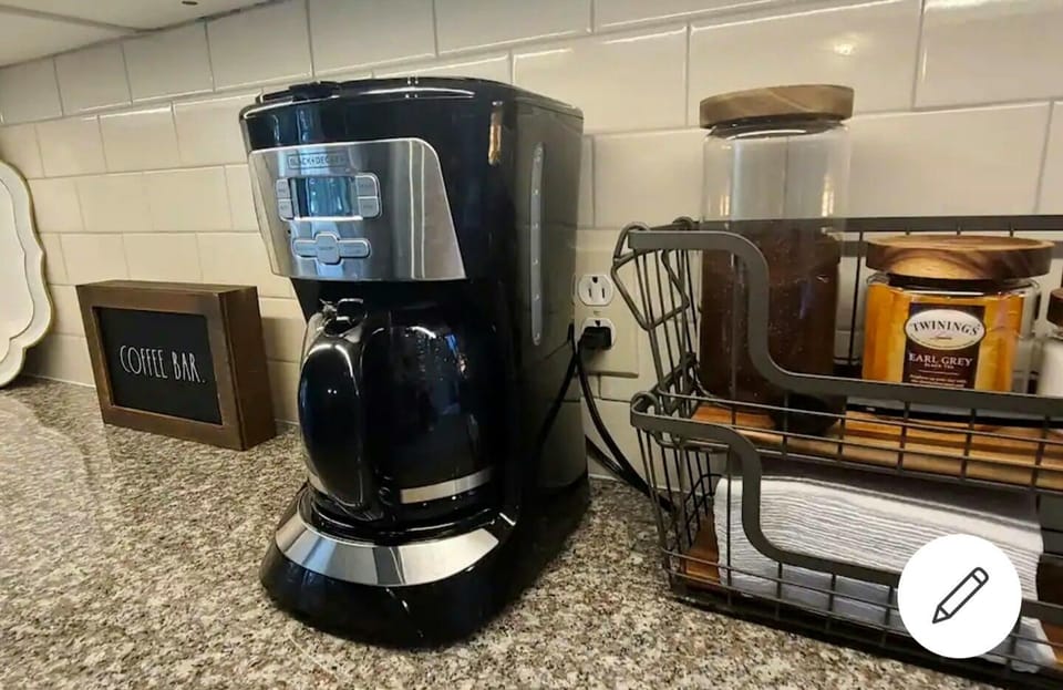 Coffee Maker with a starter supply of coffee and tea