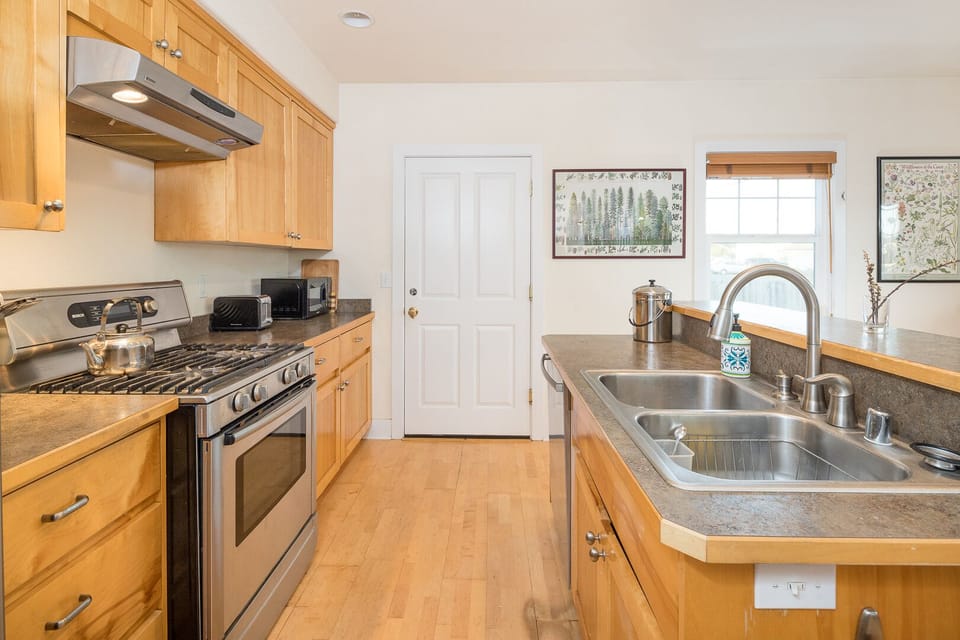 Stainless steel appliances and dishwasher.
