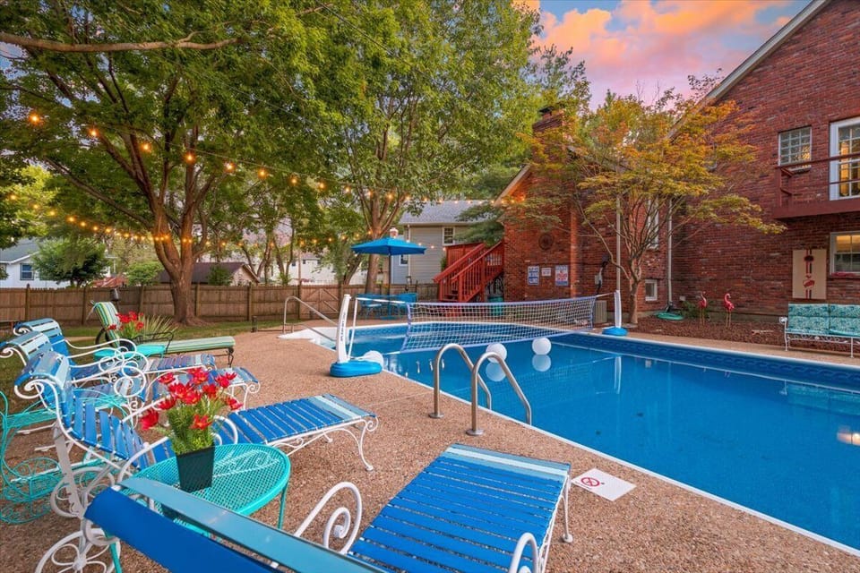 View of pool and pool loungers 