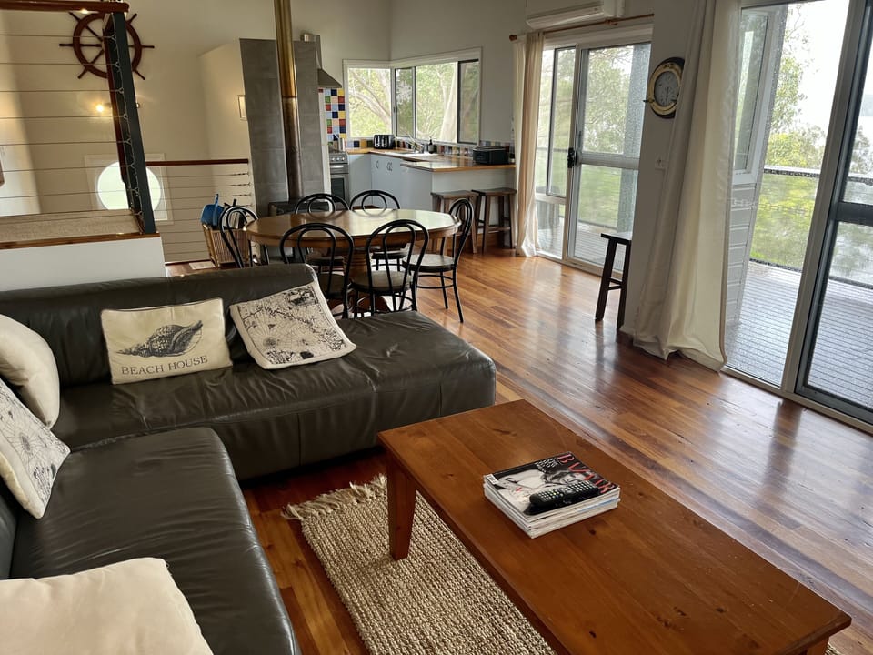 A light and airy open plan lounge, dining and kitchen.