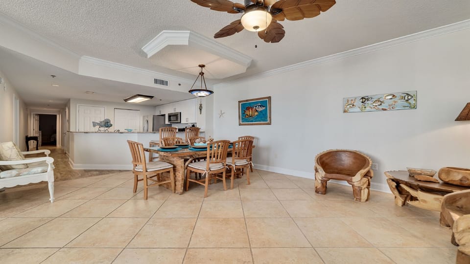 An inviting open-concept living and dining area, perfect for entertaining or relaxing in comfort.