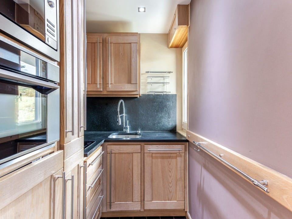 Cabinetry, Property, Countertop, Building, Wood, Interior Design, Kitchen, Wood Stain, Floor, Flooring