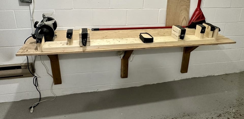 Ski & bike tuning room in the underground parkade