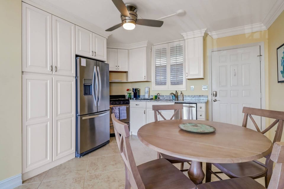 Tucked away to the left of the fridge, you'll find an in-unit stackable washer/dryer for your complimentary use.
