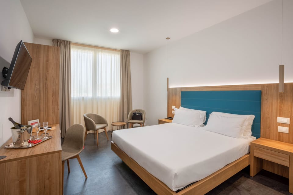 Standard Room | Memory foam beds, minibar, in-room safe, desk