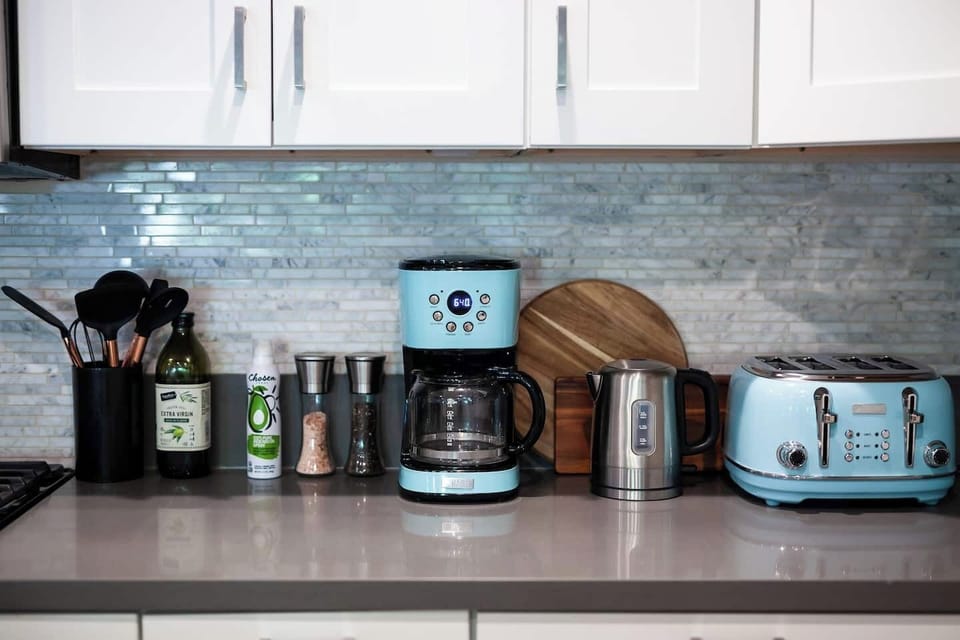 Start your day in style with our designer coffee pot and toaster