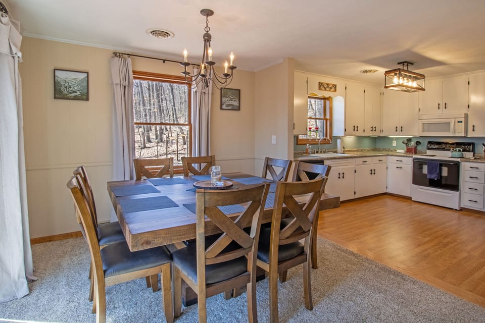 A dining area, and a full kitchen on the upper level