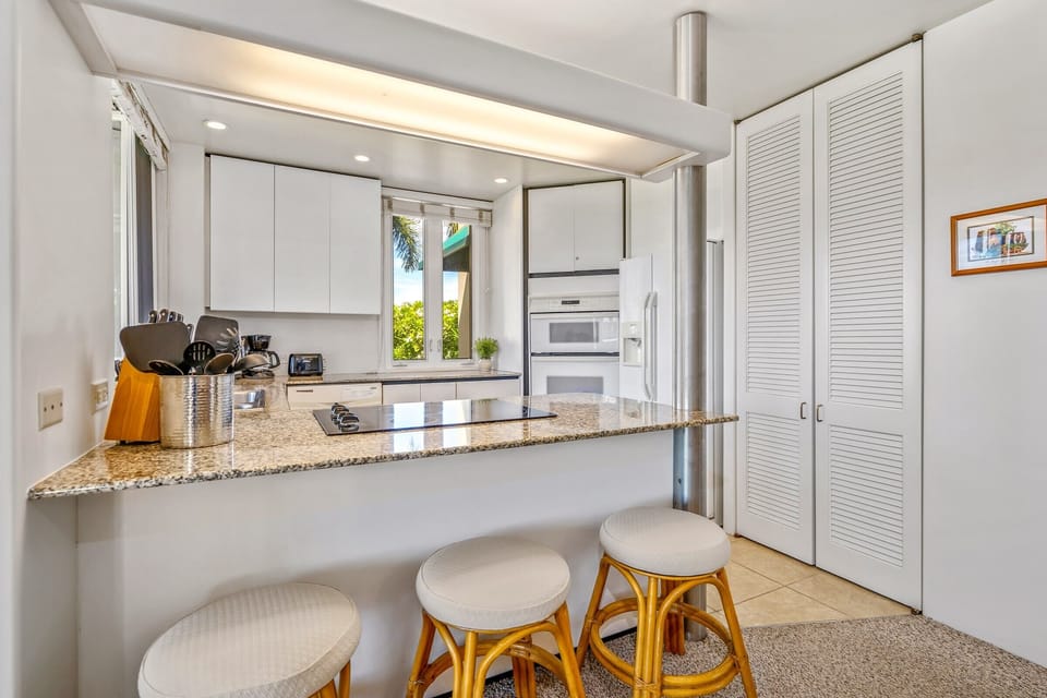 Who doesn't like to hang out near the kitchen to chat and snack?