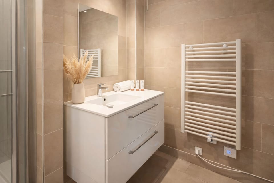 Well-maintained & functional washbasin with cabinet

